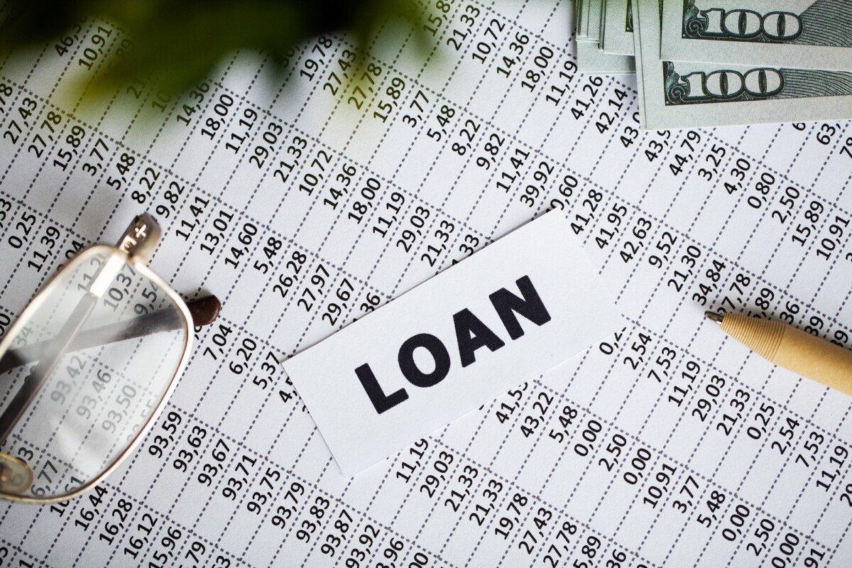 Credit concept. Loan written on white card.