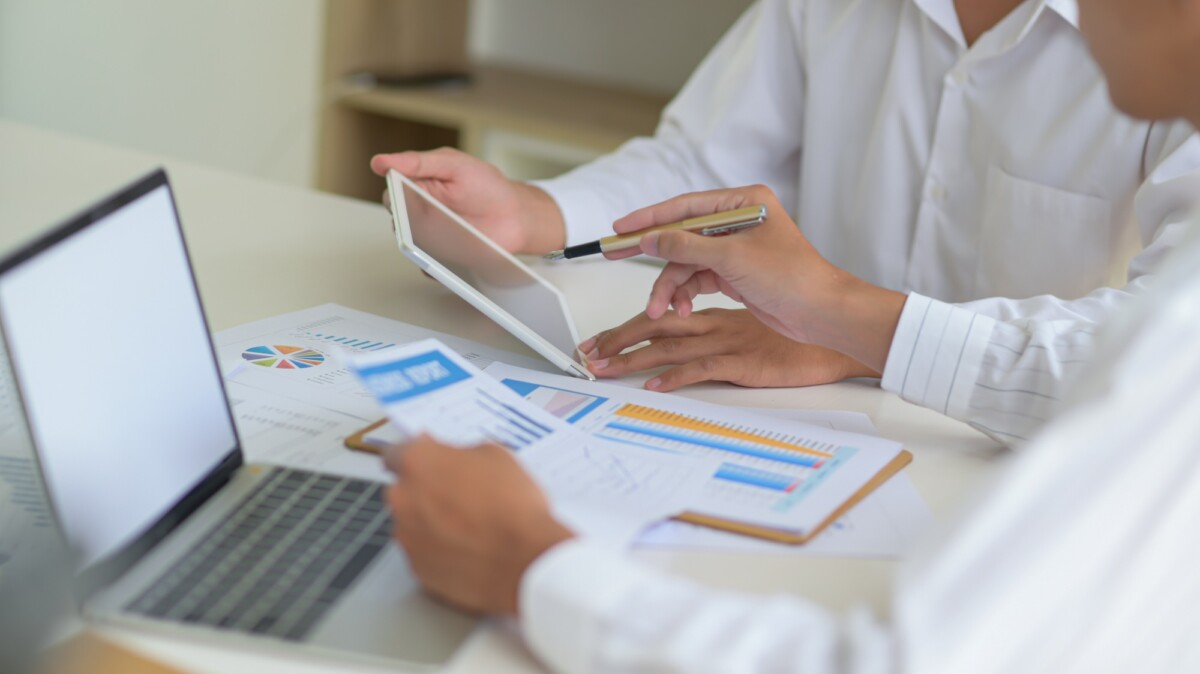 Executives with tablet are evaluating the situation of company to resolve impact of virus outbreak. Executives with tablet are evaluating the situation of company to resolve impact of virus outbreak.