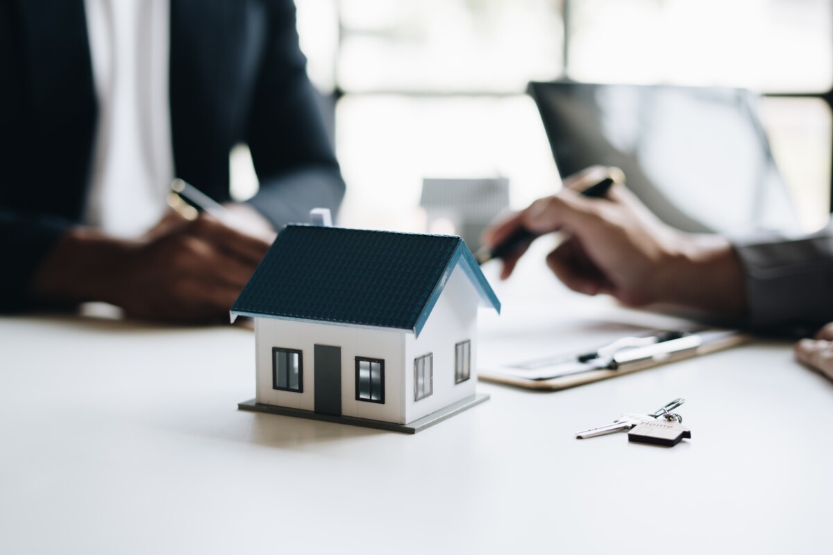Real estate agent talked about the terms of the home purchase agreement.