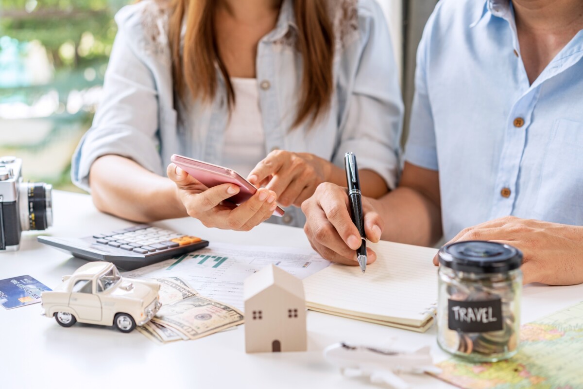 Young couple is planning and managing home expenses
